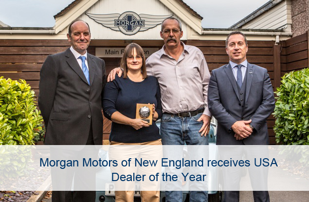photo of Ecklers receiving USA Dealer of the Year award